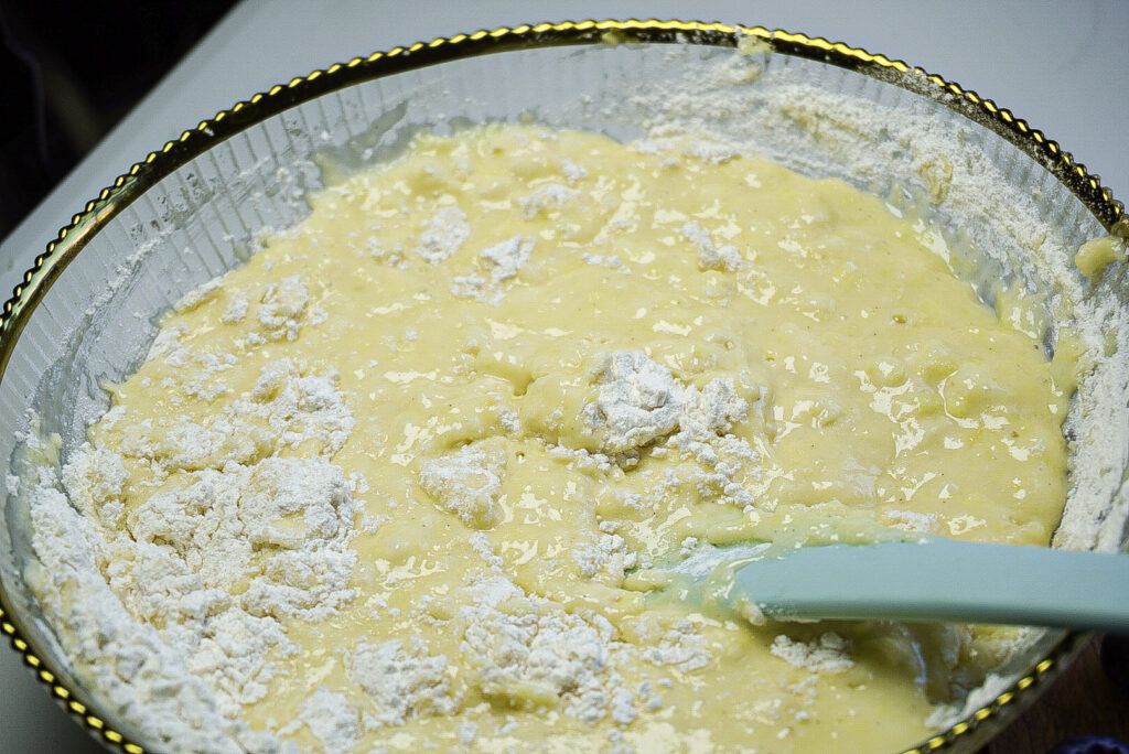 The Best Blueberry Muffins recipe You ever need batter with flour folding in