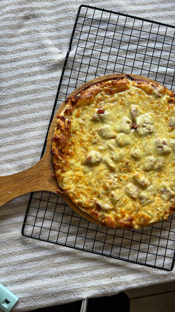 How to Make a Store-Bought Pizza Extra Cheesy 075c12b4 284f 4cb8 a997 c2a2d2c9d30e.jpg