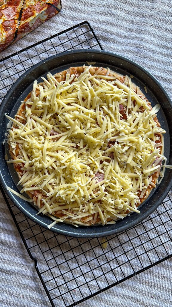 How to Make a Store-Bought Pizza Extra Cheesy pizza