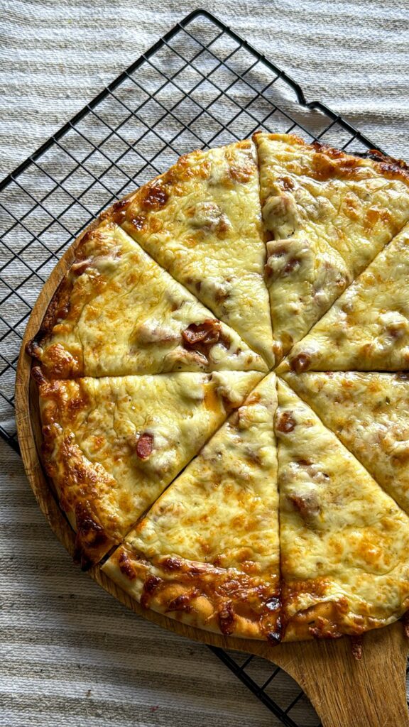 How to Make a Store-Bought Pizza Extra Cheesy slices pizza